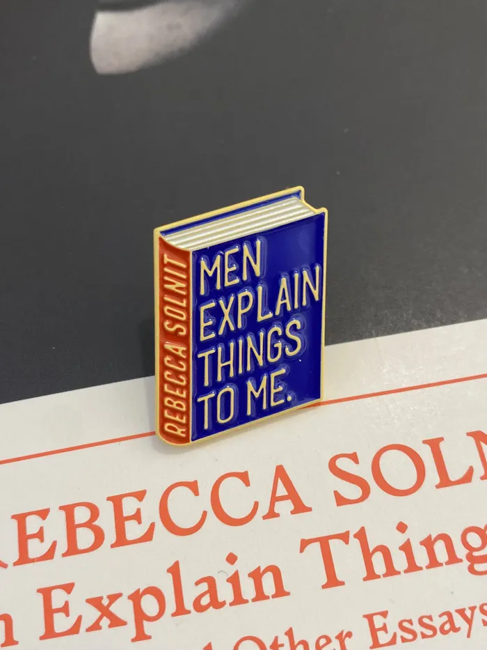 PIN A BOOK TO WEAR - REBECCA SOLNIT